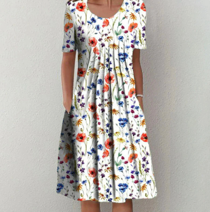 Diva | Summer dress with striking print and loose fit 0