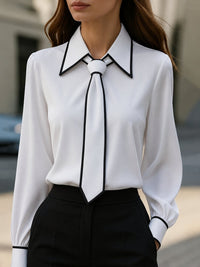 Vivian | Blusa con collo a fiocco e rifiniture a contrasto