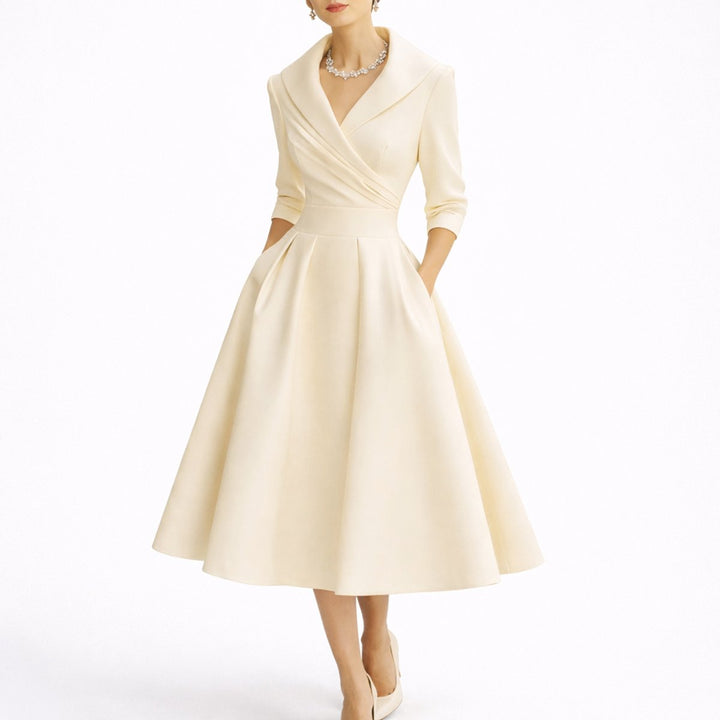 Zalina | Elegante abito midi strutturato a trapezio da donna per invitata a un matrimonio autunnale